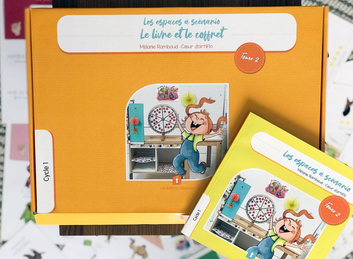 Photo du coffret orange et du livre Les espaces à scénario, tome 2